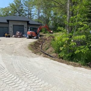 Construction - grading driveway